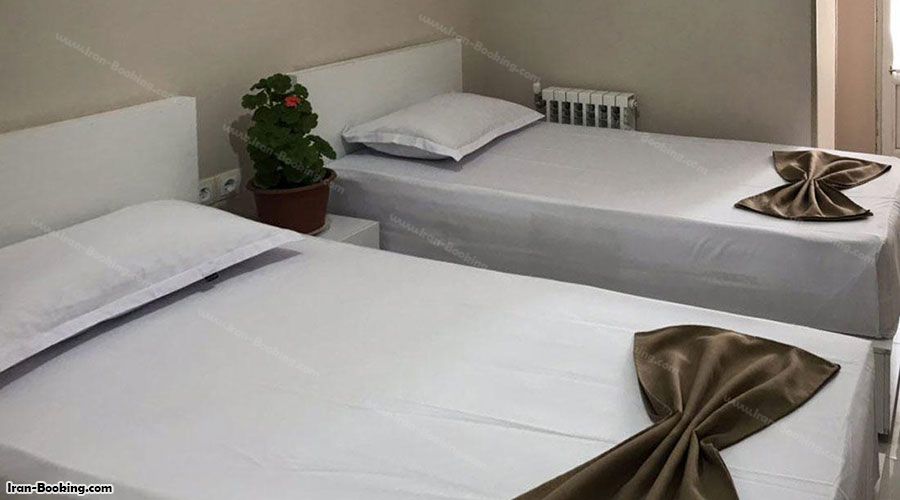 تخت اتاق هتل آپارتمان سینا قزوین